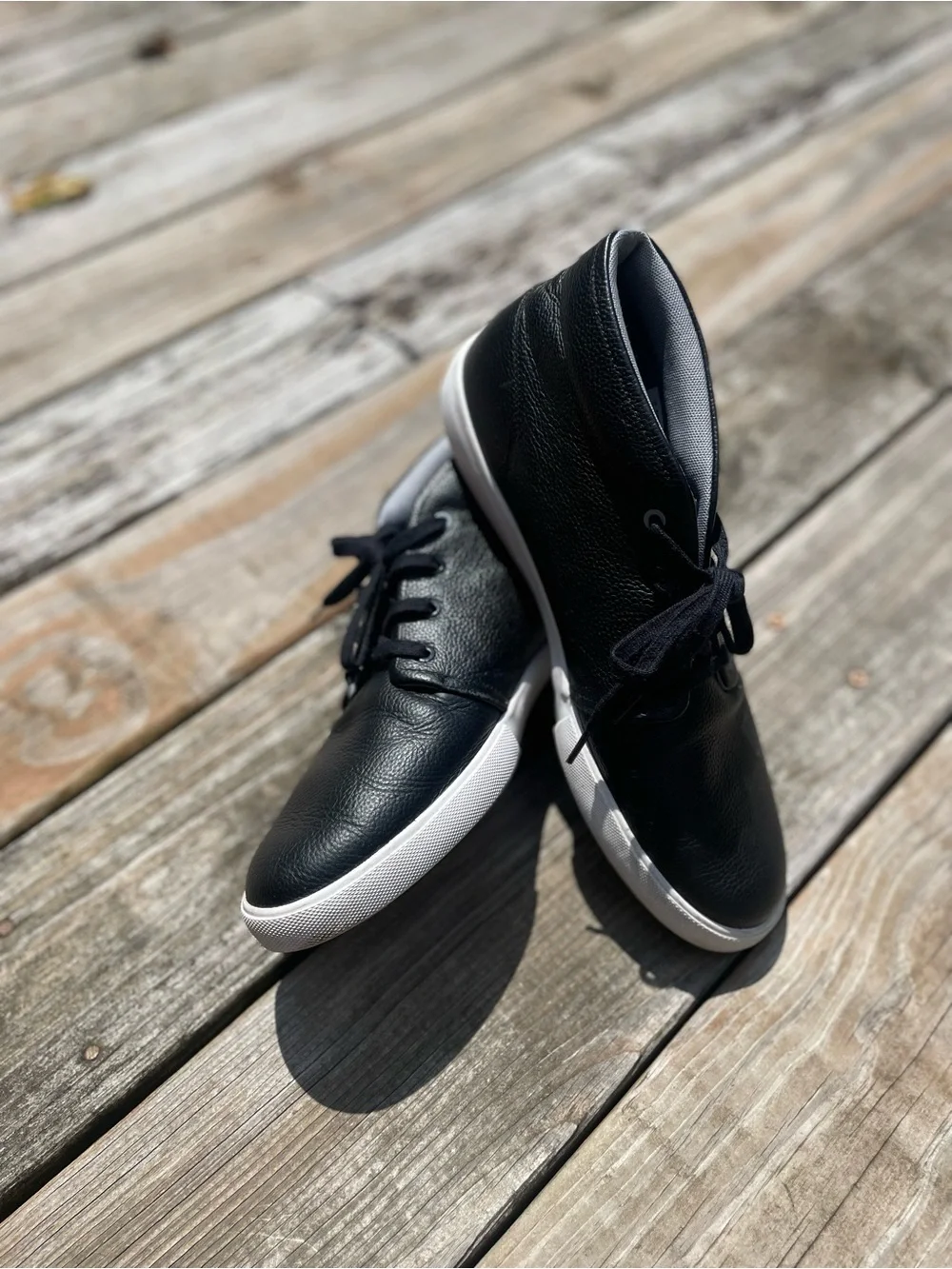 Lacoste Men's Black Leather Slip-On Style Sneakers with White Sole